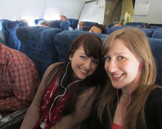 We are smiling but we really wish we were not in the middle row.